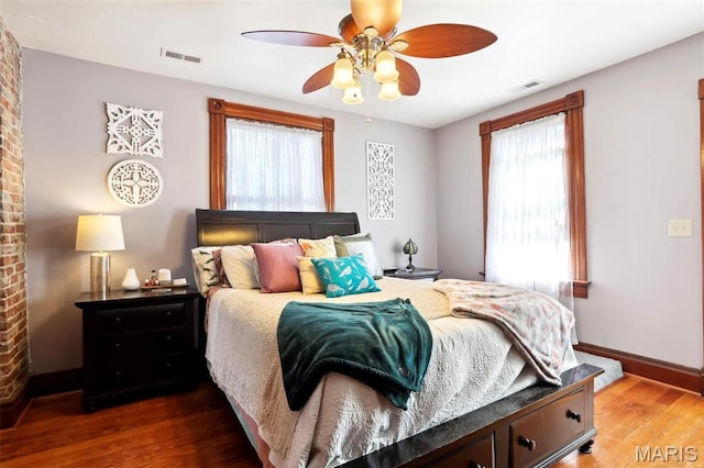 502 W 5th St, Washington, MO 63090 - bedroom with wood finished floors and ceiling fan