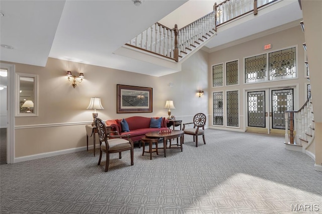 208 Ambridge Ct Unit 302, Chesterfield, MO 63017 - living area with a high ceiling, carpet floors, and stairway