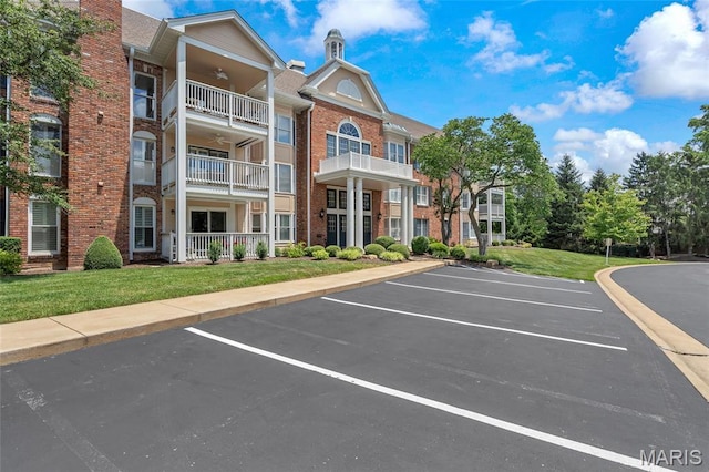 208 Ambridge Ct Unit 302, Chesterfield, MO 63017 - view of apartment building / complex with uncovered parking