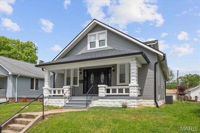 19 N 31st St N, Belleville, IL 62226 - view of front facade featuring covered porch and a front lawn