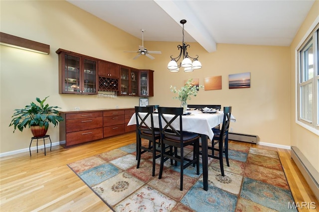 13011 Ambois Dr, Saint Louis, MO 63141 - dining space featuring baseboard heating, light wood-type flooring, a chandelier, and a ceiling fan
