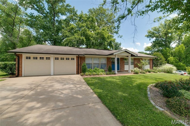 13011 Ambois Dr, Saint Louis, MO 63141 - view of front of property with an attached garage, concrete driveway, a front yard, and brick siding