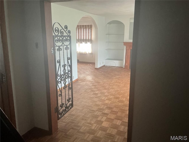 211 Edgar St, Gillespie, IL 62033 - hallway with built in shelves and arched walkways