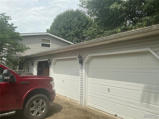 211 Edgar St, Gillespie, IL 62033 - garage with concrete driveway