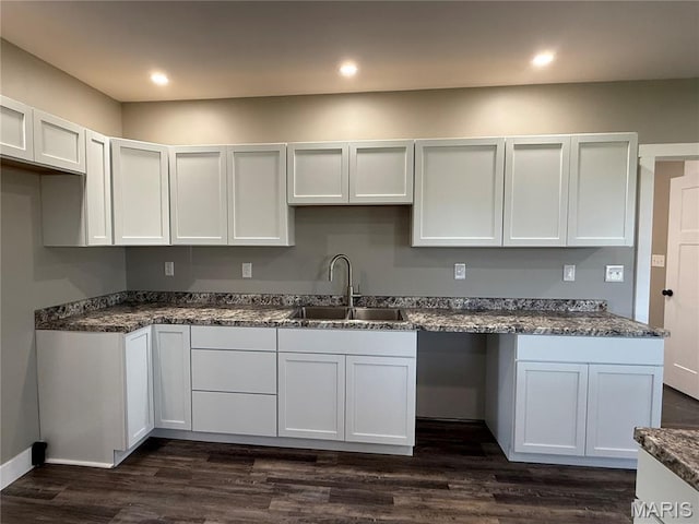 6596 County Road 263, Hannibal, MO 63401 - kitchen featuring white cabinetry, dark wood-style flooring, and recessed lighting