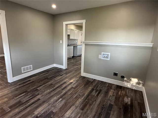 6596 County Road 263, Hannibal, MO 63401 - washroom with hookup for an electric dryer, washer hookup, dark wood-style floors, and recessed lighting