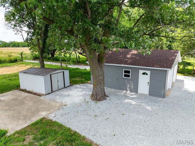 6596 County Road 263, Hannibal, MO 63401 - garage featuring a storage unit