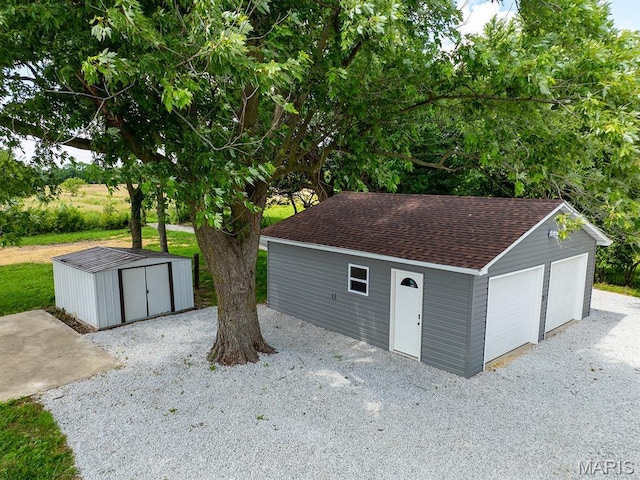6596 County Road 263, Hannibal, MO 63401 - detached garage with a storage unit