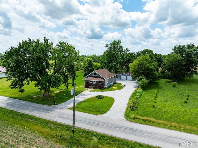 6596 County Road 263, Hannibal, MO 63401 - view of front facade featuring a front yard, an outdoor structure, and a detached garage