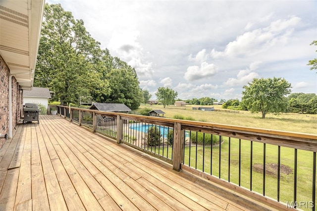 16930 Grace Rd, Lebanon, MO 65536 - deck with grilling area and a lawn