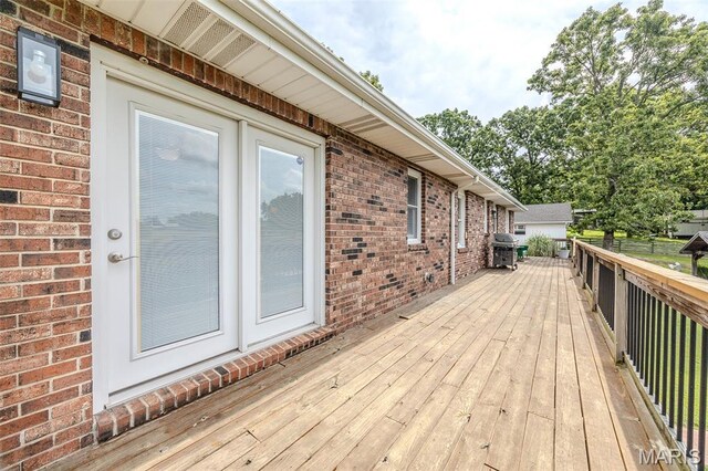 16930 Grace Rd, Lebanon, MO 65536 - wooden terrace with area for grilling