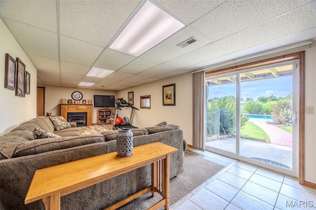 16930 Grace Rd, Lebanon, MO 65536 - living room with a fireplace and a drop ceiling