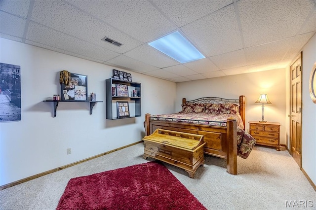 16930 Grace Rd, Lebanon, MO 65536 - carpeted bedroom with a paneled ceiling and baseboards