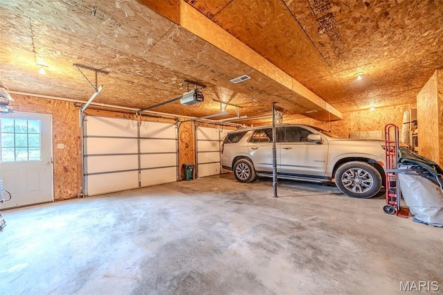 16930 Grace Rd, Lebanon, MO 65536 - garage featuring a garage door opener