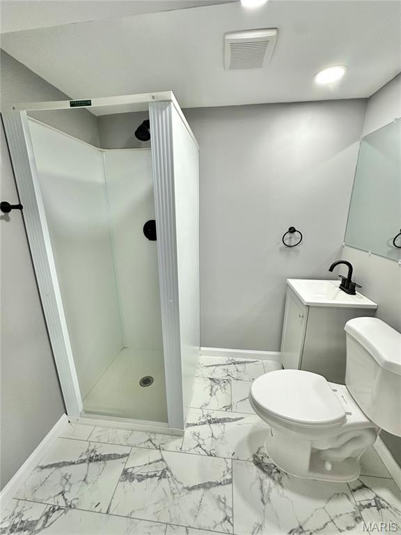 4 Fairview Dr, Saint Charles, MO 63303 - bathroom featuring marble finish floors, a stall shower, and vanity