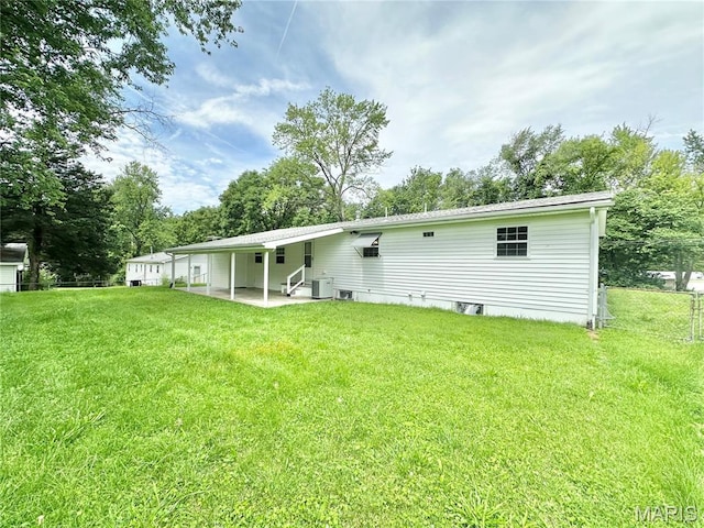 4 Fairview Dr, Saint Charles, MO 63303 - back of house with a patio area and view of scattered trees
