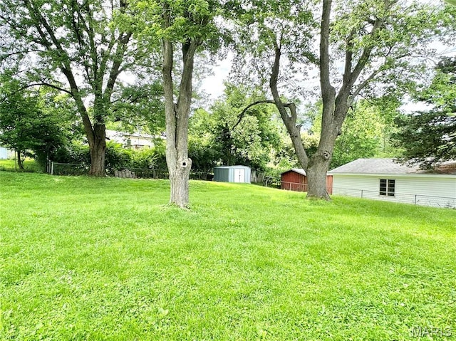 4 Fairview Dr, Saint Charles, MO 63303 - view of yard with a storage shed