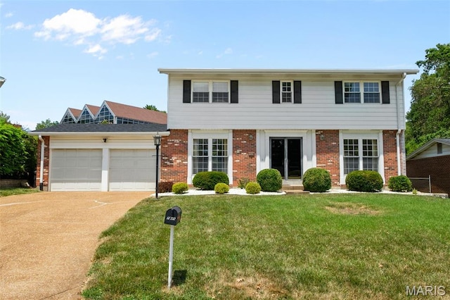 7849 Cassia Ct, Saint Louis, MO 63123 - colonial home with a garage, brick siding, driveway, and a front yard