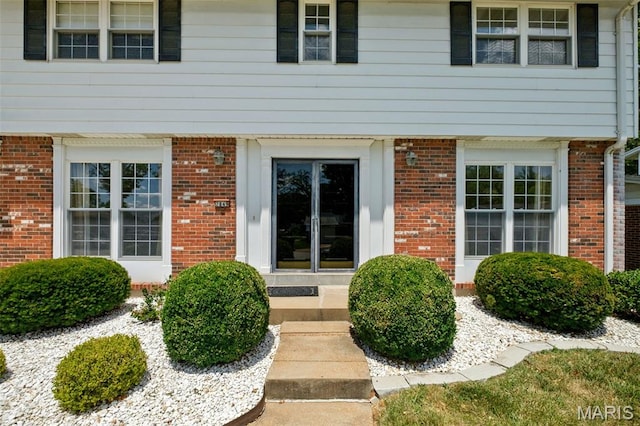 7849 Cassia Ct, Saint Louis, MO 63123 - view of exterior entry featuring brick siding