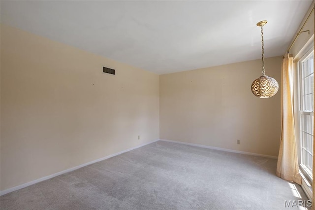 7849 Cassia Ct, Saint Louis, MO 63123 - empty room featuring light colored carpet and baseboards