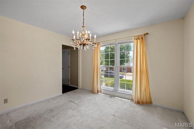 7849 Cassia Ct, Saint Louis, MO 63123 - unfurnished dining area with carpet floors and a chandelier