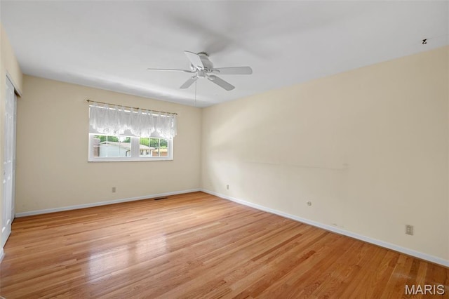 7849 Cassia Ct, Saint Louis, MO 63123 - empty room featuring light wood-style floors and a ceiling fan
