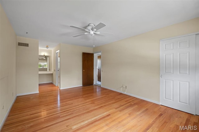 7849 Cassia Ct, Saint Louis, MO 63123 - unfurnished room with light wood-style flooring and a ceiling fan