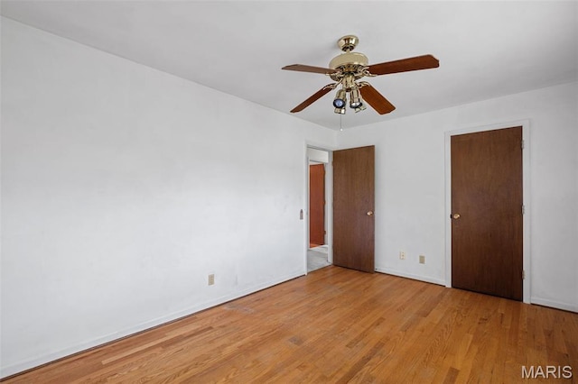 7849 Cassia Ct, Saint Louis, MO 63123 - unfurnished bedroom with light wood-type flooring and a ceiling fan