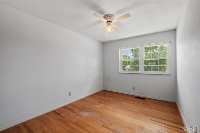 7849 Cassia Ct, Saint Louis, MO 63123 - unfurnished room featuring light wood-type flooring and ceiling fan