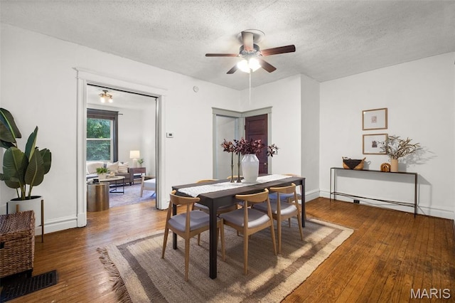 2929 Victor St, Saint Louis, MO 63104 - dining area featuring a ceiling fan, a textured ceiling, and hardwood / wood-style flooring