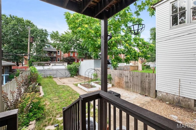 2929 Victor St, Saint Louis, MO 63104 - fenced backyard with a vegetable garden
