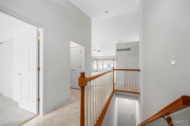 2749 Samuel Dr Unit 736A, Dardenne Prairie, MO 63368 - hall featuring an upstairs landing and baseboards