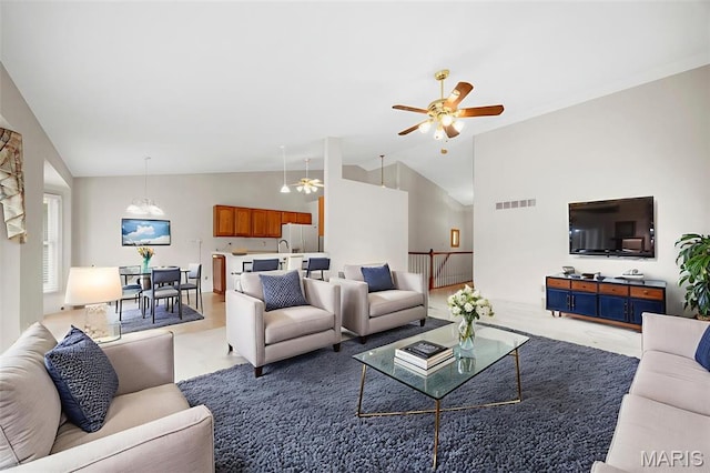 2749 Samuel Dr Unit 736A, Dardenne Prairie, MO 63368 - living area with a ceiling fan and lofted ceiling
