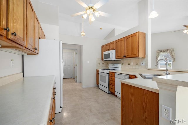 2749 Samuel Dr Unit 736A, Dardenne Prairie, MO 63368 - kitchen with white appliances, a ceiling fan, light countertops, a peninsula, and decorative backsplash