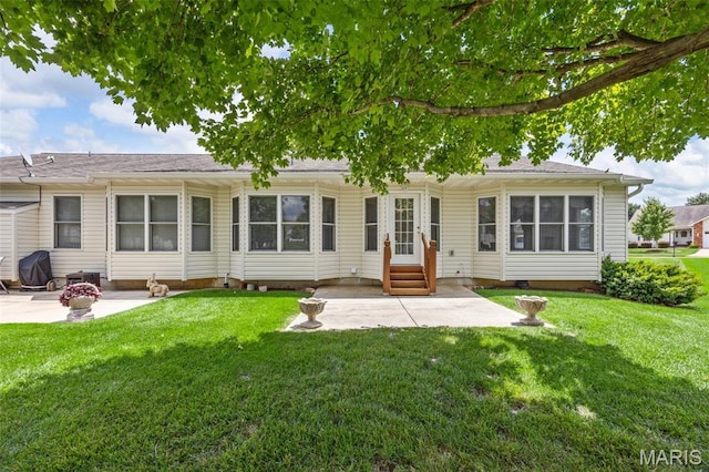 2749 Samuel Dr Unit 736A, Dardenne Prairie, MO 63368 - rear view of property featuring a patio area, entry steps, and a lawn