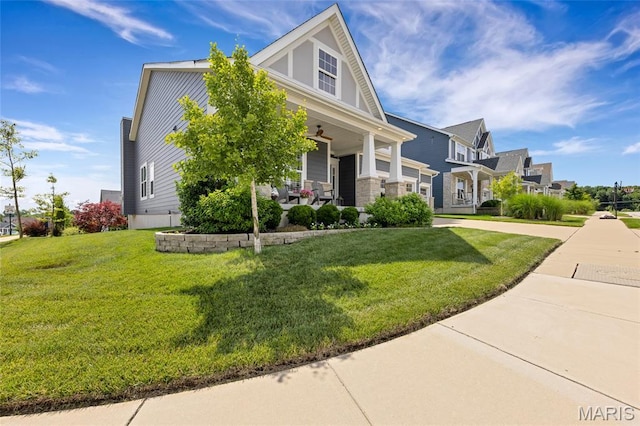 2308 Sand Cherry Dr, Wildwood, MO 63011 - view of front of home featuring covered porch and a front lawn