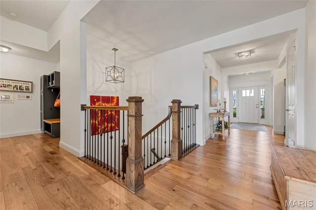 2308 Sand Cherry Dr, Wildwood, MO 63011 - foyer entrance featuring light wood-style flooring and a chandelier