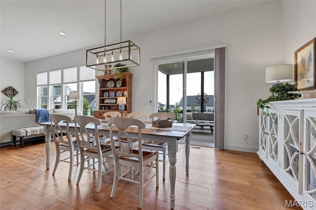 2308 Sand Cherry Dr, Wildwood, MO 63011 - dining room featuring light wood-style flooring and recessed lighting