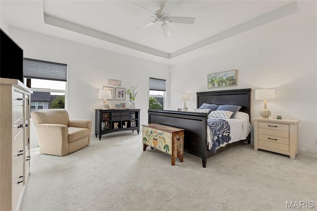2308 Sand Cherry Dr, Wildwood, MO 63011 - carpeted bedroom with a raised ceiling and ceiling fan