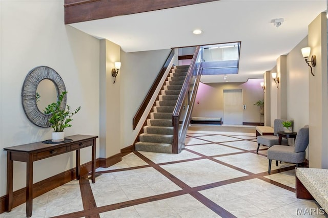 4570 Laclede Ave Unit 301, Saint Louis, MO 63108 - staircase featuring inlaid floor details and recessed lighting