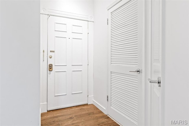 4570 Laclede Ave Unit 301, Saint Louis, MO 63108 - doorway to outside with wood finished floors
