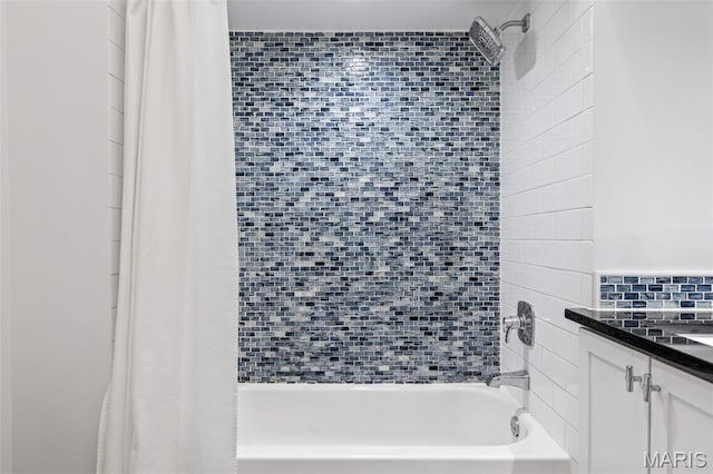 4570 Laclede Ave Unit 301, Saint Louis, MO 63108 - full bath featuring shower / tub combo with curtain and vanity