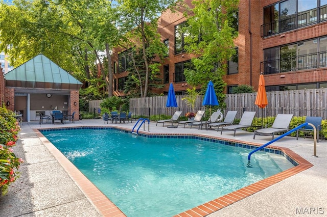 4570 Laclede Ave Unit 301, Saint Louis, MO 63108 - community pool featuring a patio area