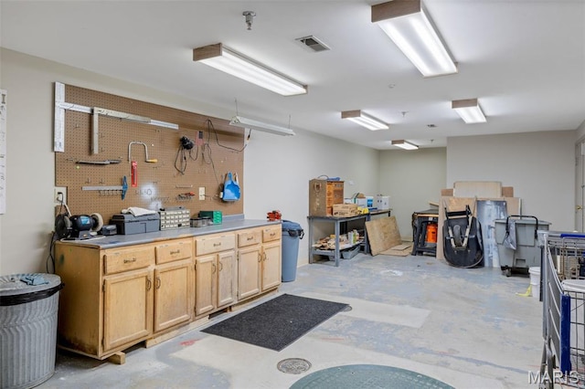 4570 Laclede Ave Unit 301, Saint Louis, MO 63108 - misc room with a workshop area and concrete floors
