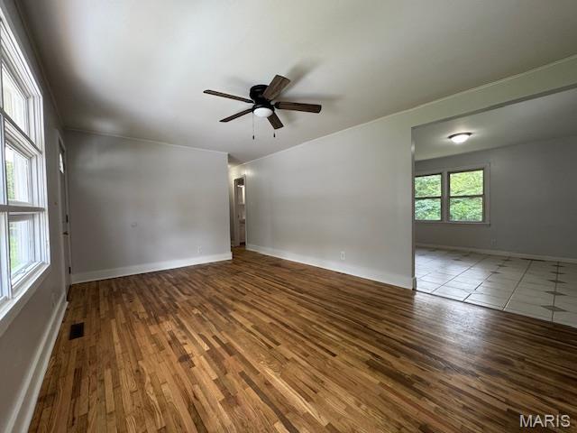 618 Houston Rd, Rolla, MO 65401 - spare room featuring wood finished floors and ceiling fan
