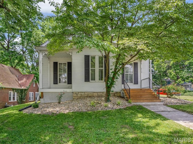 1734 Seminary St, Alton, IL 62002 - obstructed view of property featuring a front yard