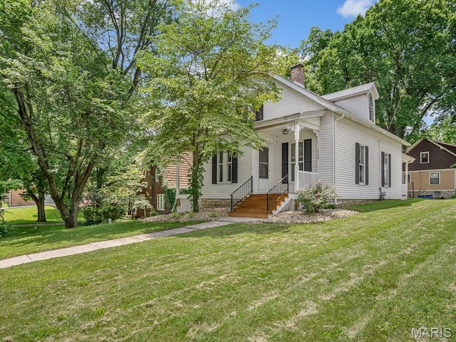 1734 Seminary St, Alton, IL 62002 - view of front of property with a chimney and a front lawn