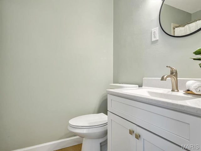 1734 Seminary St, Alton, IL 62002 - full bathroom with vanity and wood finished floors