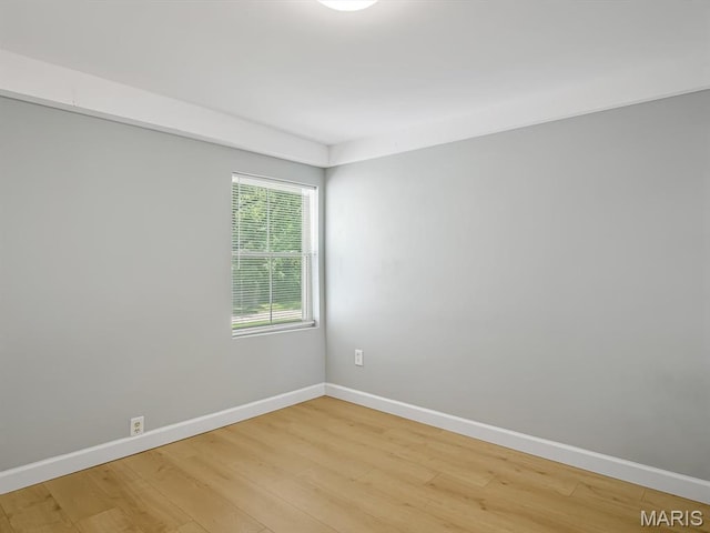 1734 Seminary St, Alton, IL 62002 - empty room featuring light wood-style floors and baseboards