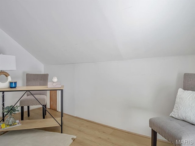 1734 Seminary St, Alton, IL 62002 - home office featuring light wood-style floors and vaulted ceiling